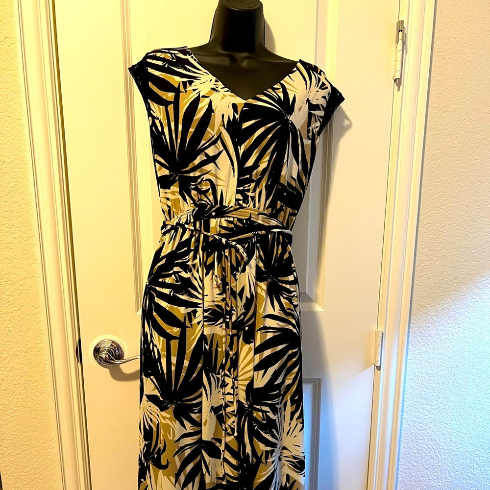 High/low tropical dress in neutral black, taupe, brown, and beige tones